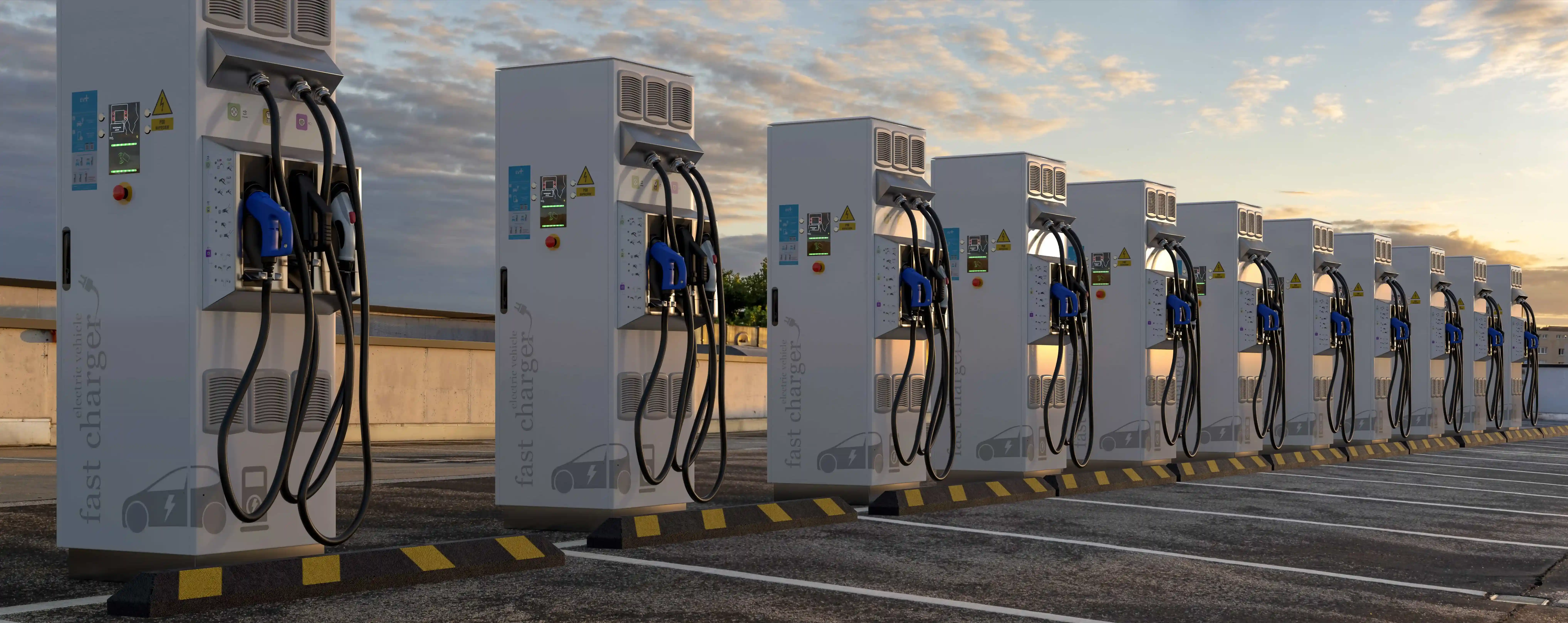 Image of several public Level 3 DCFC electric vehicle charging stations ready for use